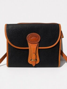 Dooney & Bourke Black with Tan Trim Pebbled Leather Crossbody